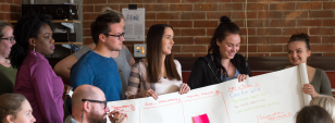 A group of students present their work during a class