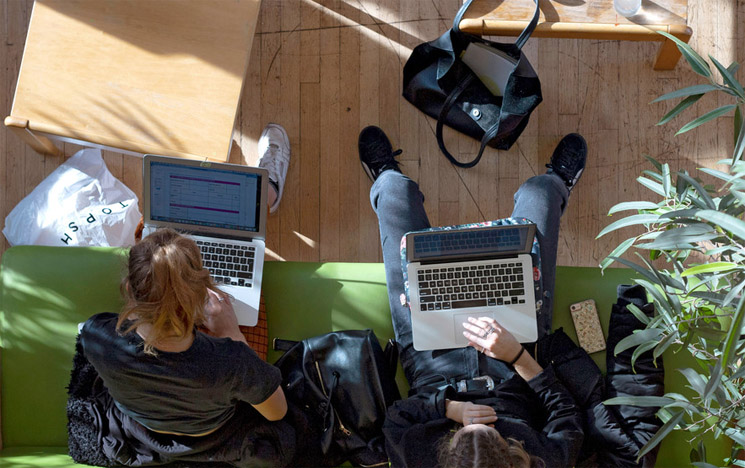 students in common room studying