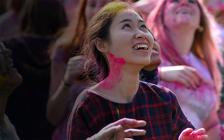 Students celebrate the Holi festival at the University of Sussex