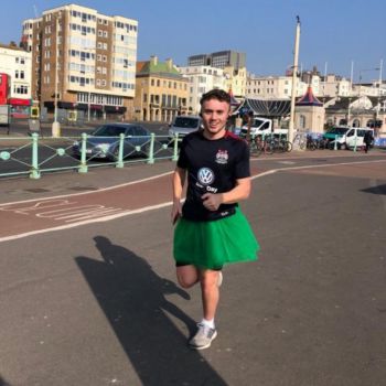 Sussex student Nathan Andrews, a member of the Men's Rugby Club, runs along the seafront in a green tutu to raise money for the Samaritans charity.