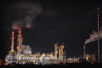 An oil refinery operating at night