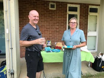 Two ESW doctoral researchers join picnic outside Essex House