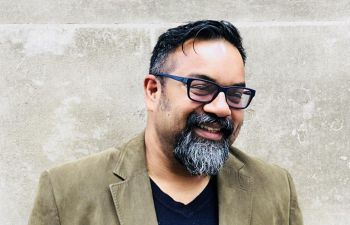 Smiling headshot of Atif Choudhury, Co-Founder and CEO of Diversity & Ability