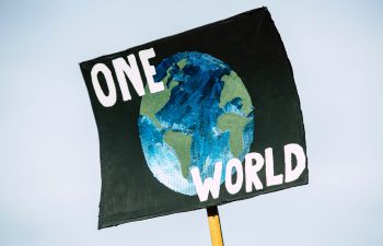 banner with planet earth and the message 