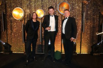 Sussex Business Awards 2021: Graphite Digital (winner - centre) Zoe Lyons (host, left) Marcus Atkinson (Business School, right)