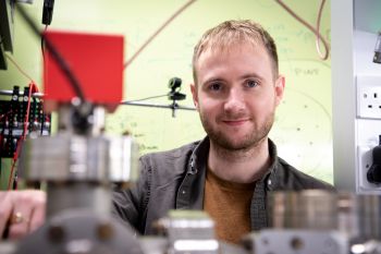 Lead author of the paper, Dr Thomas Barrett, in the Quantum Systems and Devices laboratory at the University of Sussex