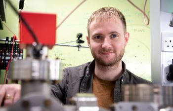 Lead author of the paper, Dr Thomas Barrett, in the Quantum Systems and Devices laboratory at the University of Sussex