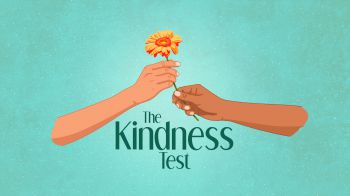 The Kindness Test logo which depicts one hand giving a different hand a yellow flower with a turquoise background