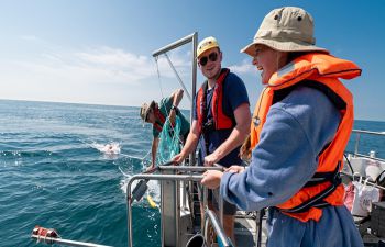 Researchers on a boat