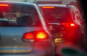 Two cars are lined up in a traffic jam