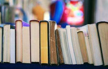 image of a stack of worn books