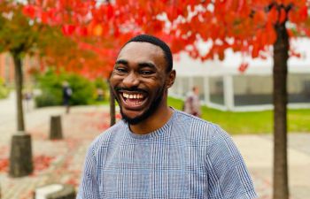 Portrait of Joshua smiling in the Spring time