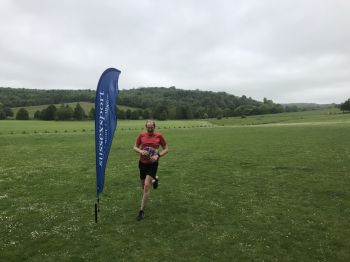 Jonathan Pinder corssing the finishing line