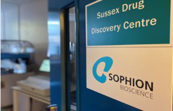 An open door with two signs, one reading 'Sussex Drug Discovery Centre' the other 'Sophion Bioscience'