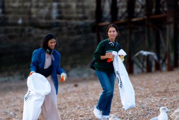 Students talking at a Beach Clean in September