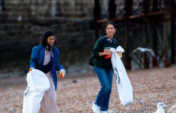 Students talking at a Beach Clean in September