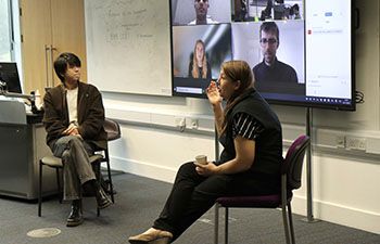 Fintech Coffee Connect event - Senior Lecturer Malgorzata Sulimierska interacting with the guest speakers