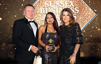Marcus Atkinson and Natasha Kaplinsky OBE presenting the Sussex Business Award to winner Aneela Rose