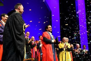 Chancellor Sanjeev Bhaskar OBE receiving his surprise honorary degree