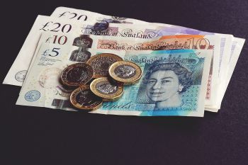 Coins and notes - photo by Suzy Hazelwood, via Pexels