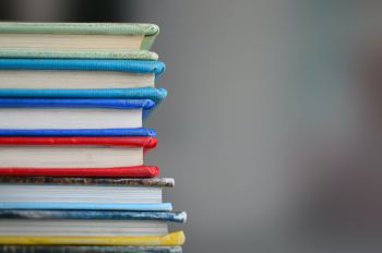 stack of colourful books