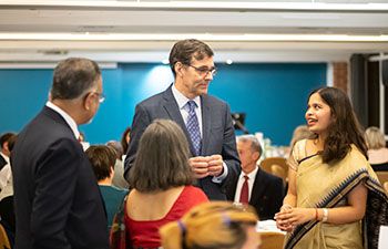 Steve McGuire congratulating prize winner Aishwarya Chakravarty