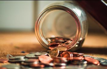 Money jar with coins