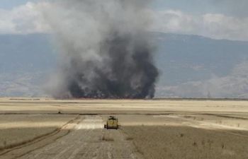 Fires to be seen during harvesting wheat fields in the Idleb Governorate