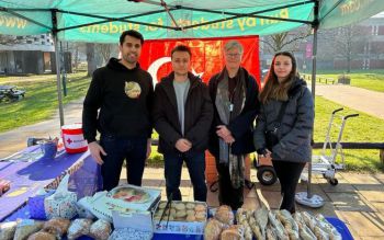 Vice-Chancellor Professor Sasha Roseneil and members of the Turkish society at their bake sale stall in Library square