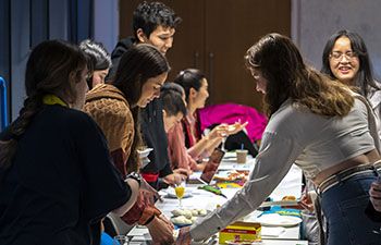 Guests enjoying food from around the globe at the Global Fair