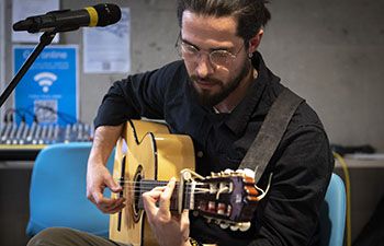 Guitarist performance at the Global Fair