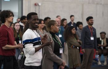 Students listening to talks at an event in the Student Centre on campus