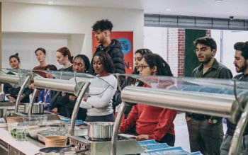 Group of students attending one of the cooking lessons