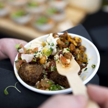 Bowl of healthy food with wooden spoon