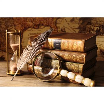 image of medievel looking books, a feather and magnifying glass