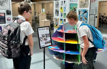 Photo of BACA pupils revisiting the giant brain