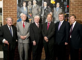 Vice-Chancellors Lord (Asa) Briggs, Sir Denys Wilkinson, Sir Leslie Fielding, Professor Gordon Conway, Professor Alasdair Smith and Professor Michael Farthing, with a portrait of Sussex's seven VCs