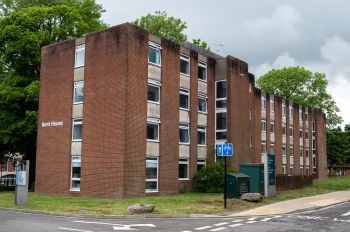 red brick building with a sign reading 'Kent House'