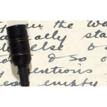 photograph of handwritten text and a pen