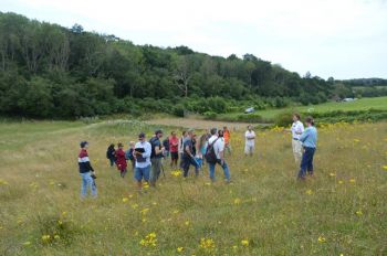 Group of people standing in a field