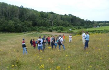 Group of people standing in a field