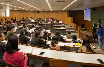 Student sat in a lecture theatre and Ahmedabad University