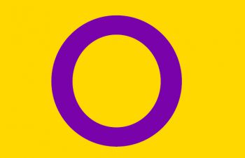 a yellow background with a purple ring in the centre.