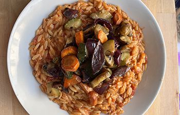 A bowl of orzo pasta and vegetables made from one of the recipe meal kits