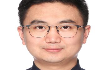 A portrait headshot of SPRU lecturer, Dr Xiangming Tao