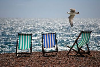 Deckchairs on a beach