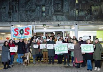 Group of Rights of the River campaigner holding placards, outside Council buildings