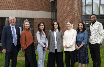 Pitch for the Planet Winners standing outside of ACCA