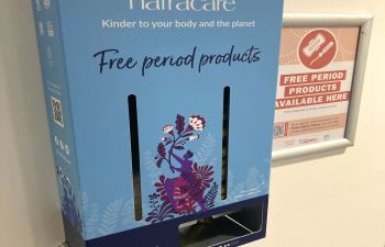 An image of a Natracare free period products dispenser