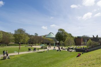 A photo of the University of Sussex Campus with the Meeting House in the background